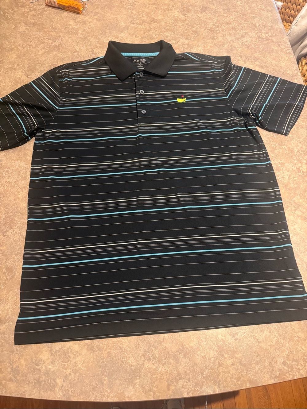 MASTERS Black Striped Polo with Blue Accent and Yellow Logo